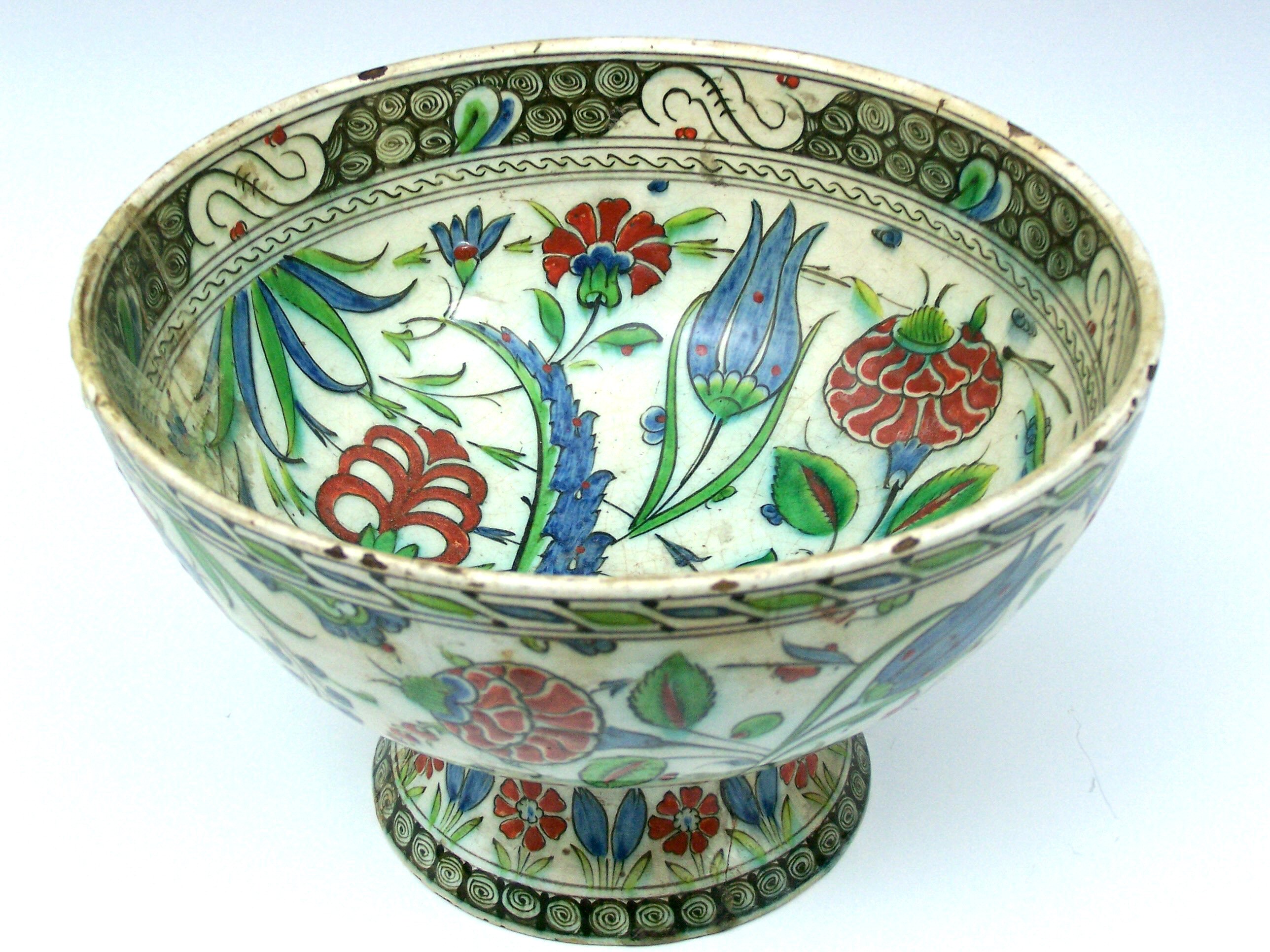 A circular footed Iznik bowl,