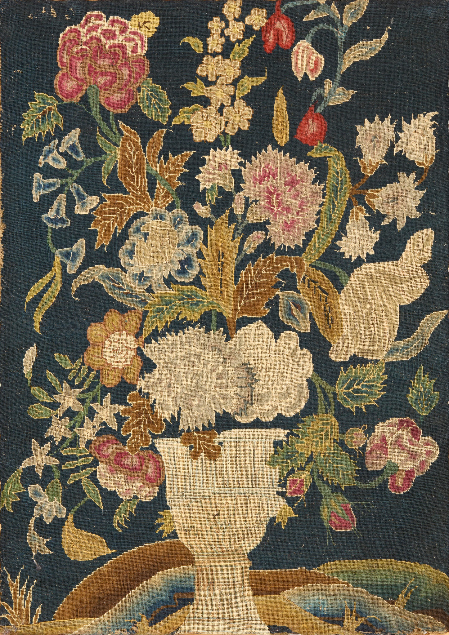 GEORGE II NEEDLEWORK PANEL OF A FLORAL STILL LIFE
