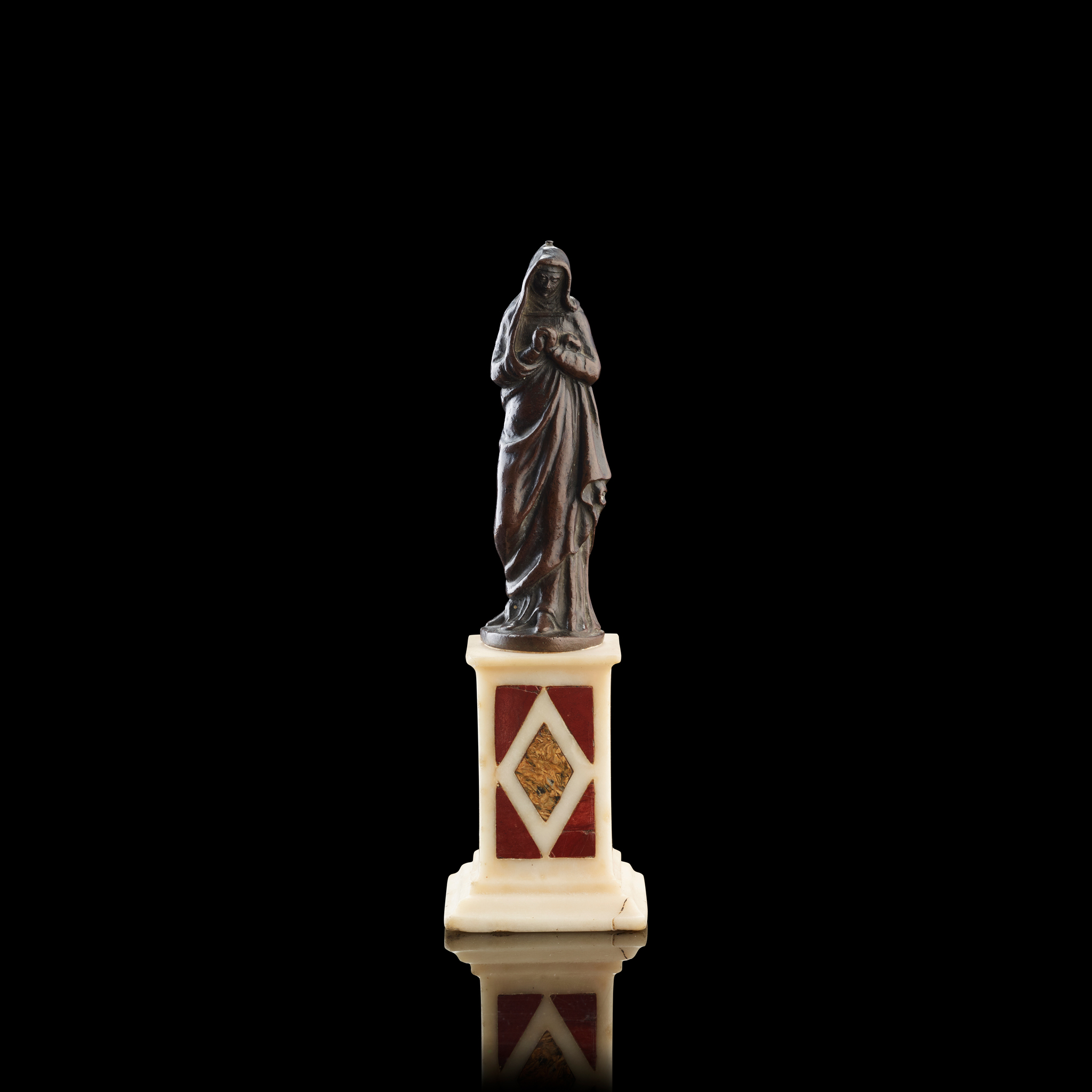 A NORTH ITALIAN BRONZE FIGURE OF A FEMALE SAINT