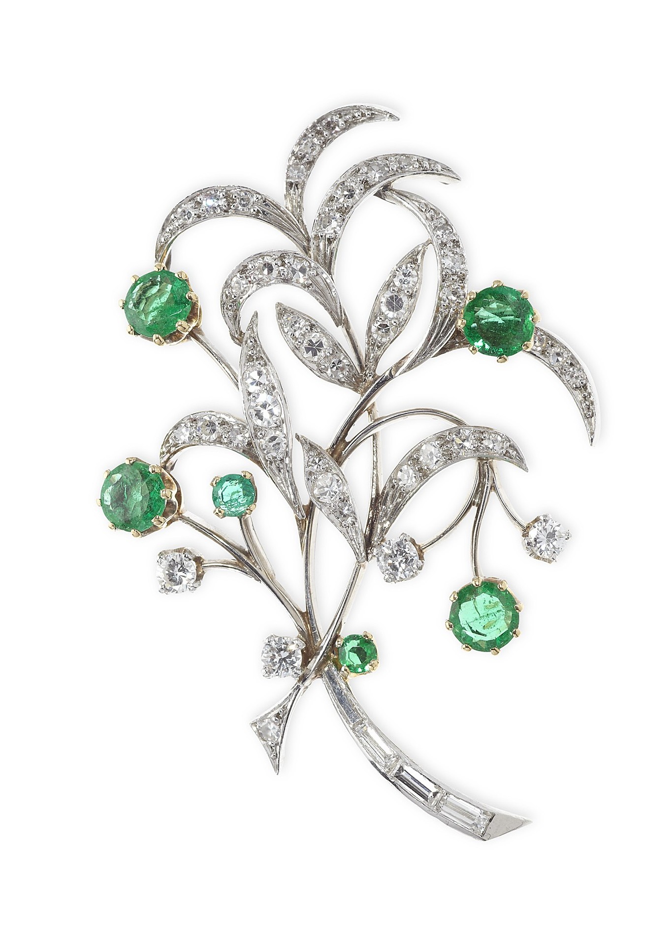 An emerald and diamond set brooch
