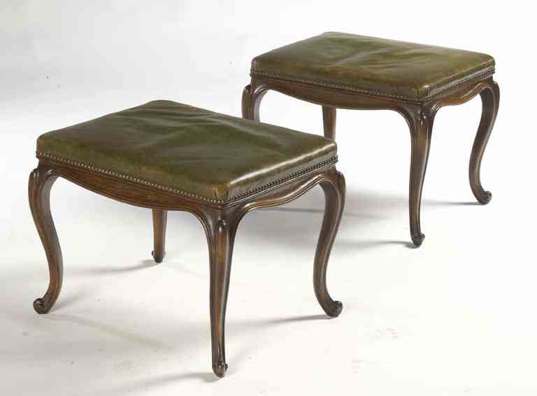 A pair of Victorian mahogany framed dressing stools