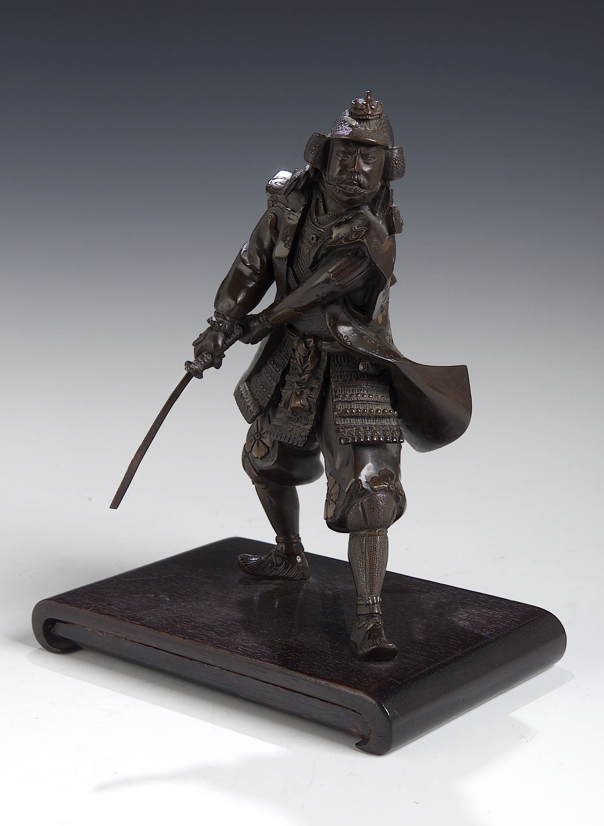 A Japanese bronze figure of a Samurai warrior