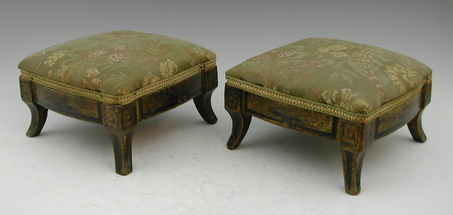 A pair of Regency footstools,