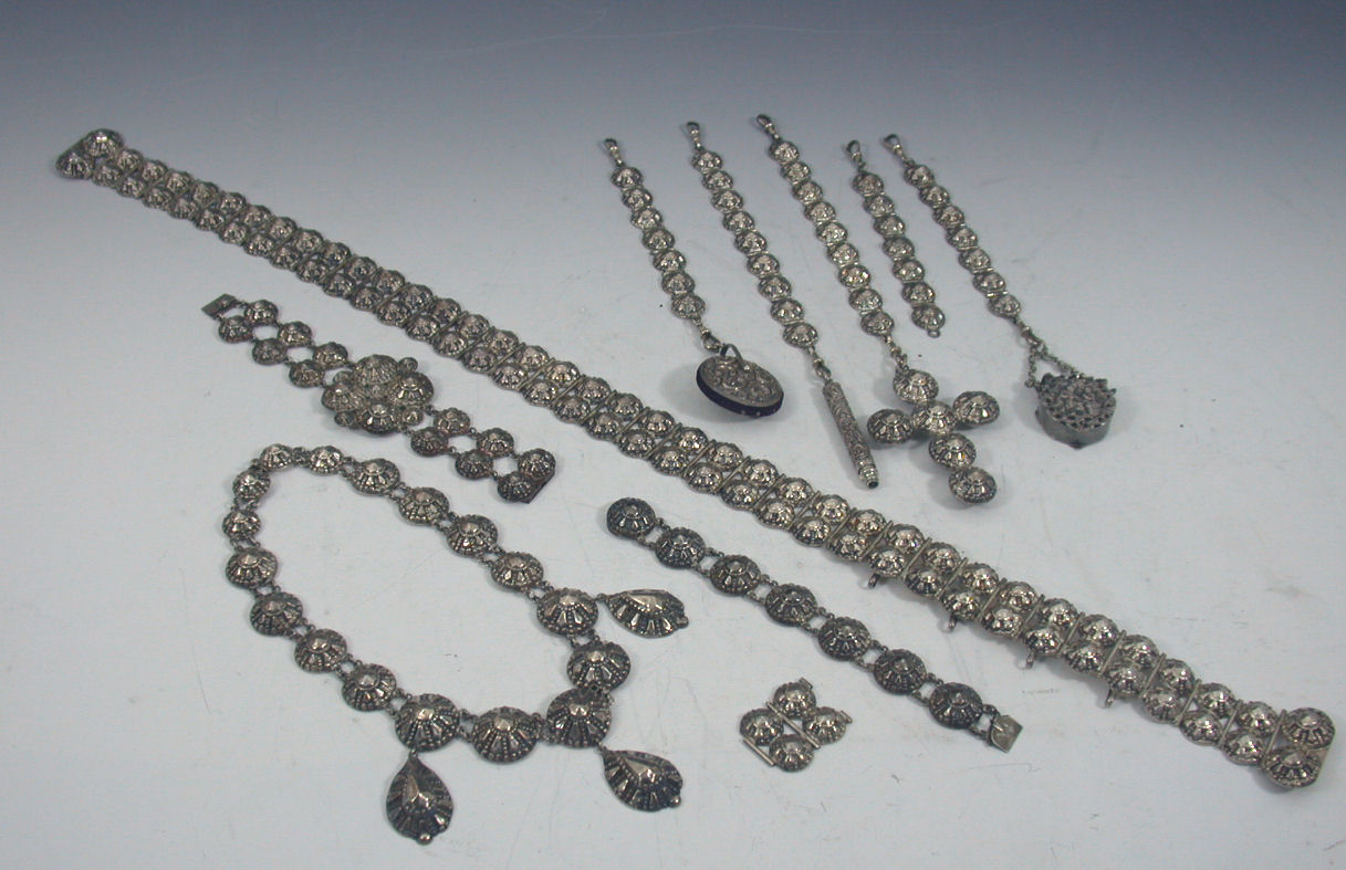 A continental white metal chatelaine with matching items,