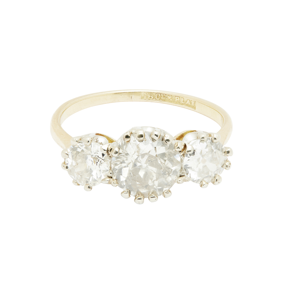 A three stone diamond set ring