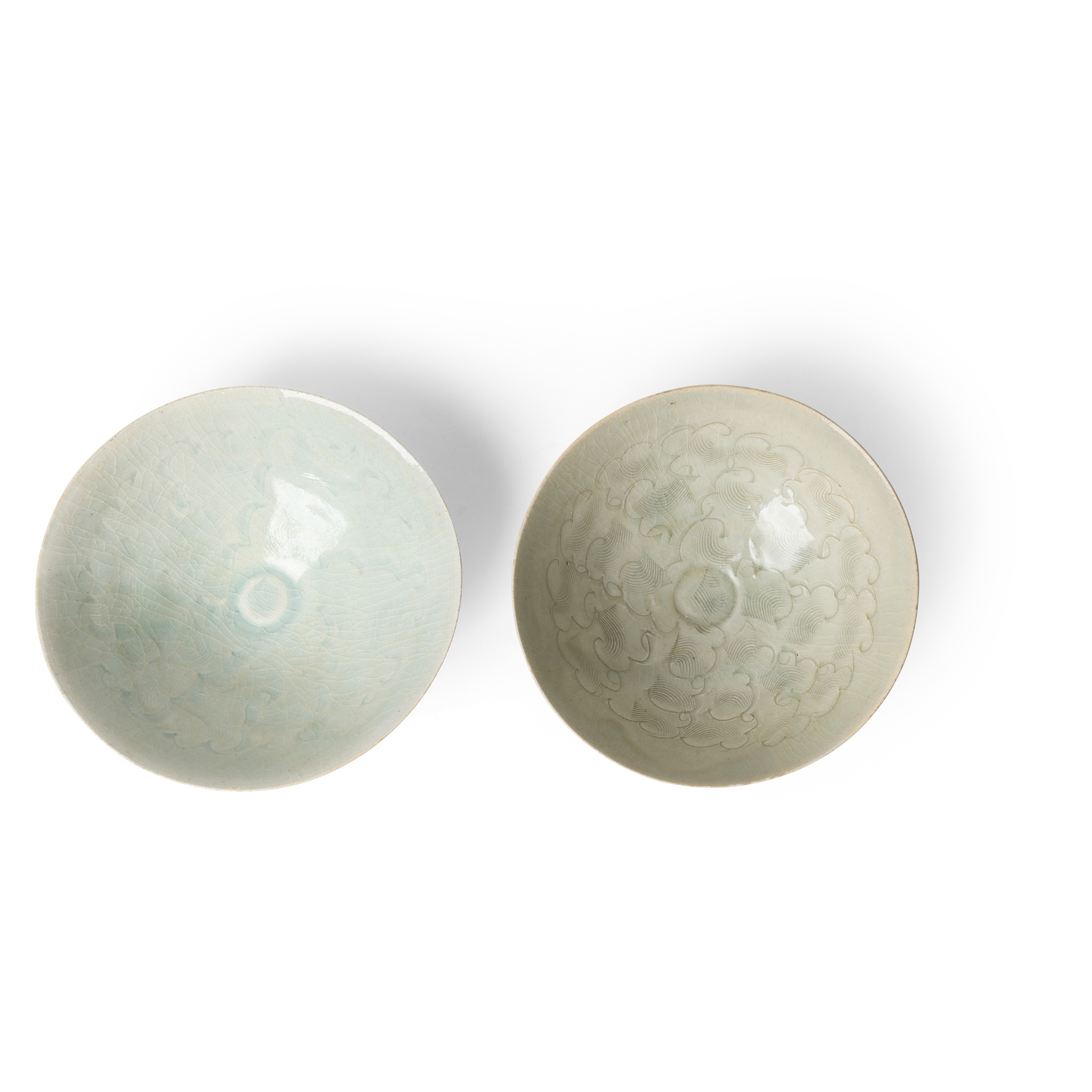 TWO CHINESE QINGBAI 'CLOUD SCROLL' CONICAL BOWLS