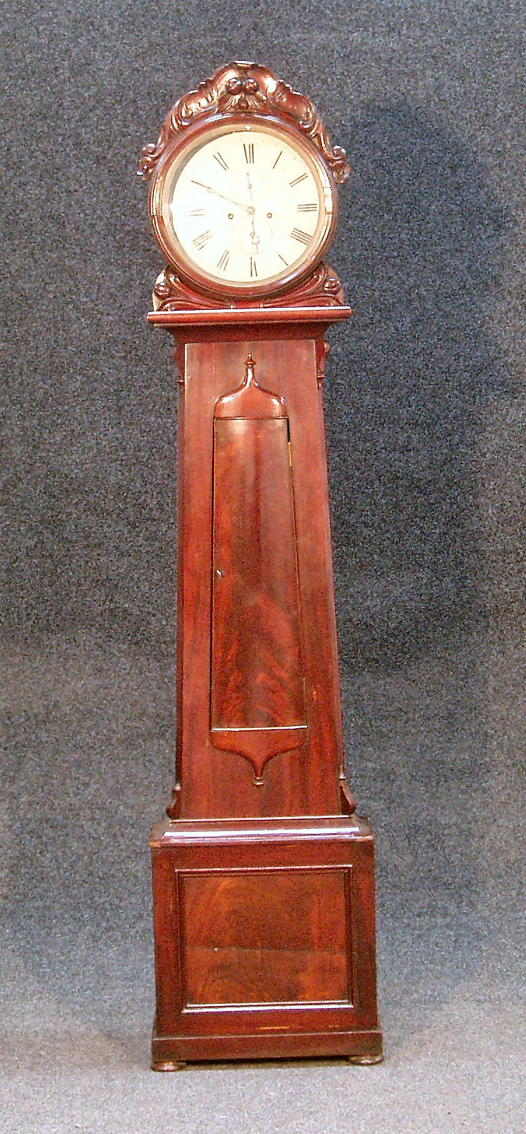 A William IV period mahogany drumhead longcase clock
