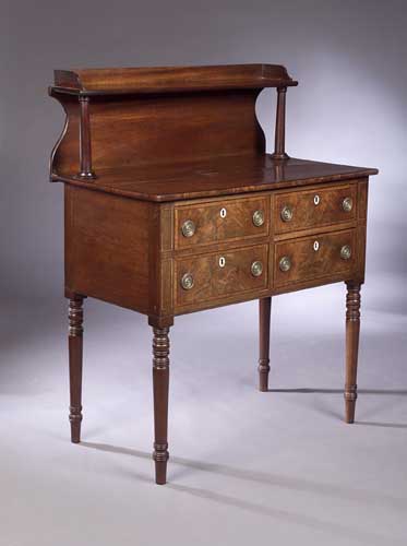 An early 19th century mahogany side table