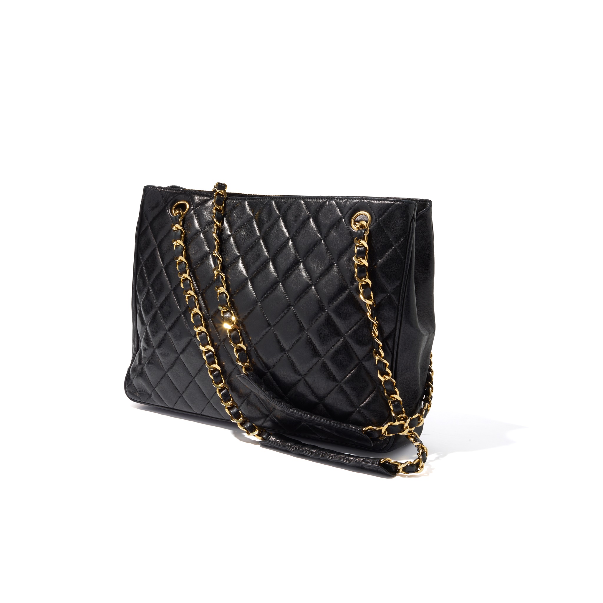 Chanel: A black leather tote