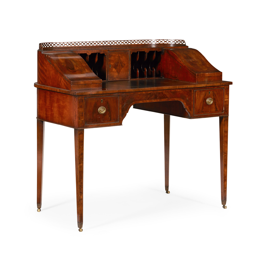 LATE GEORGIAN MAHOGANY AND WALNUT CARLTON HOUSE DESK