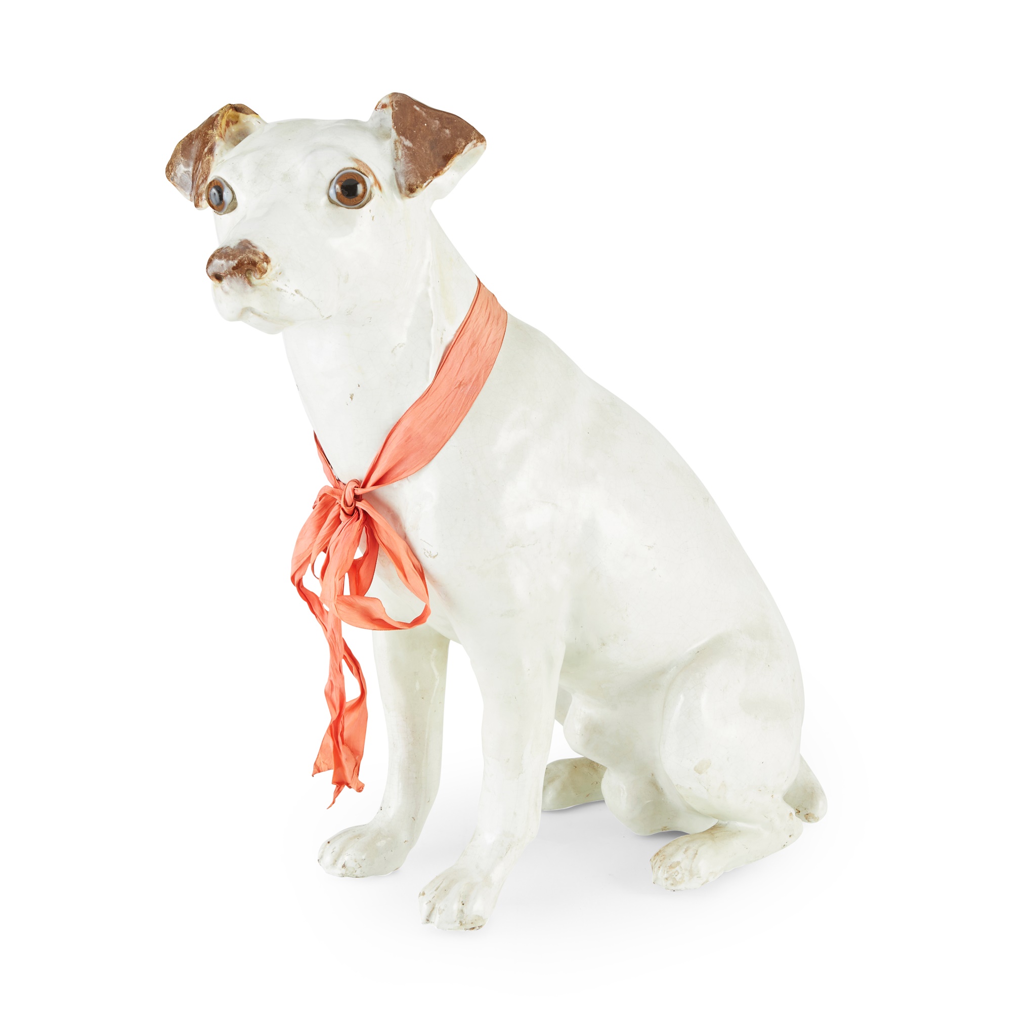TIN-GLAZED TERRACOTTA FIGURE OF A TERRIER