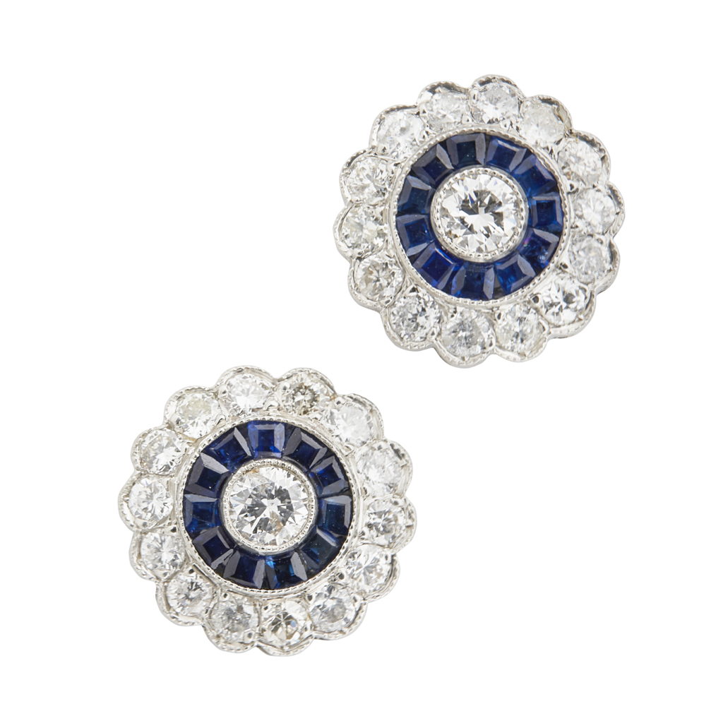 A pair of diamond and sapphire set cluster earrings