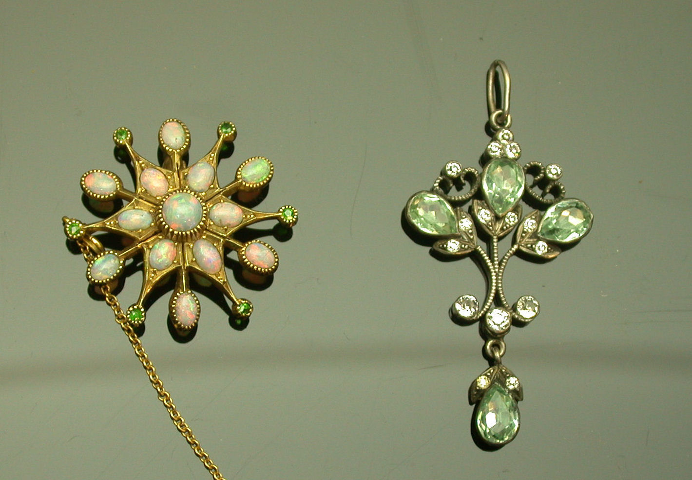 An Edwardian opal and demantoid garnet brooch,