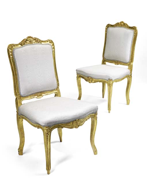 A pair of 19th century French giltwood framed side chairs