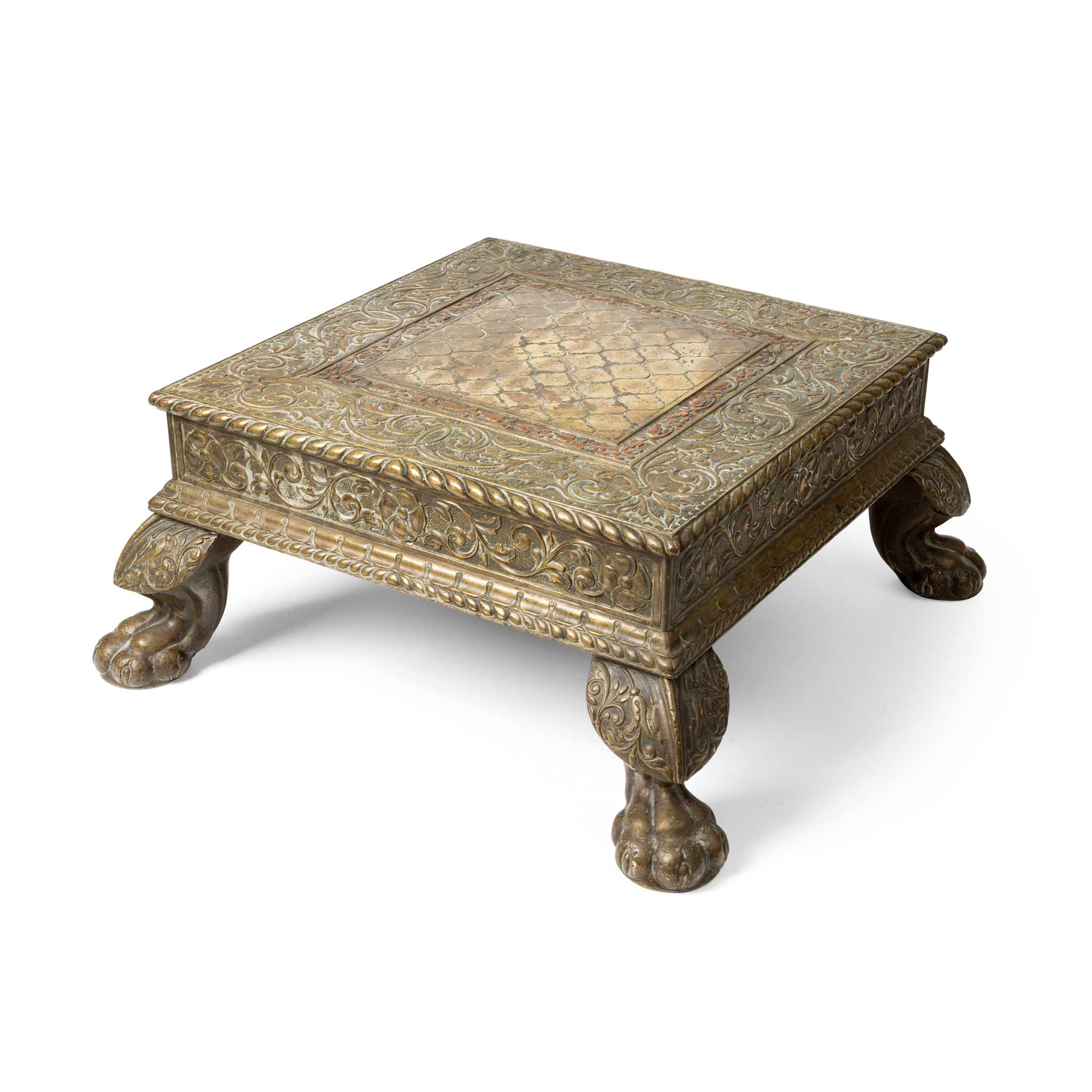 AN INDIAN BRASS LOW TABLE