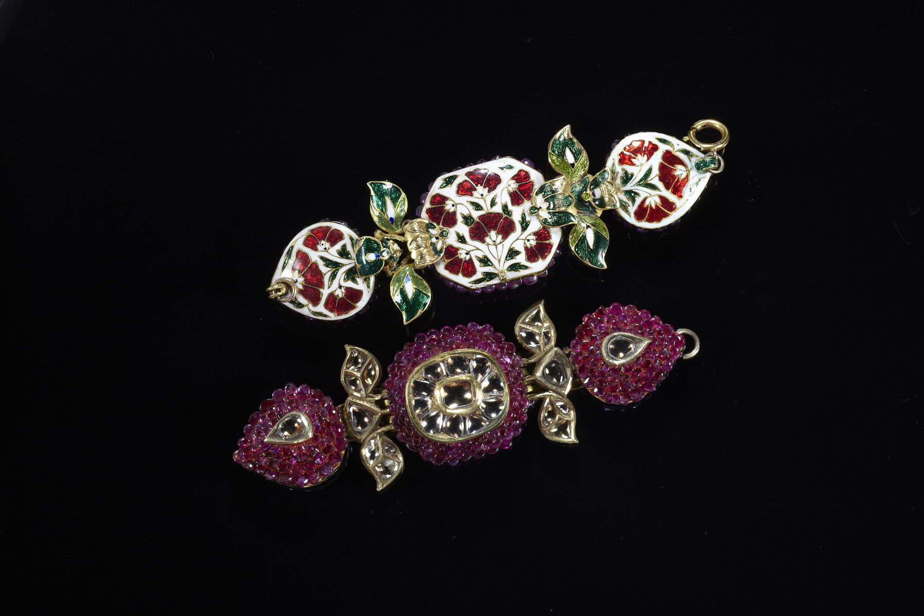 A pair of Indian ruby and diamond set upper arm bracelets
