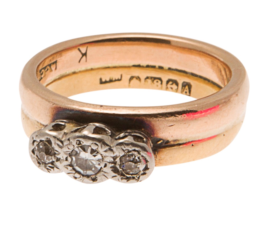 A three stone diamond set ring