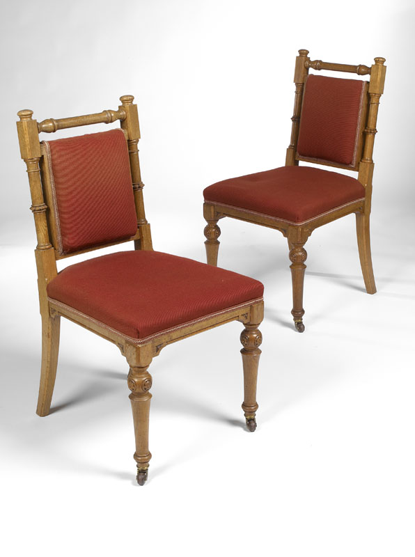 A set of nineteen Victorian period oak dining chairs
