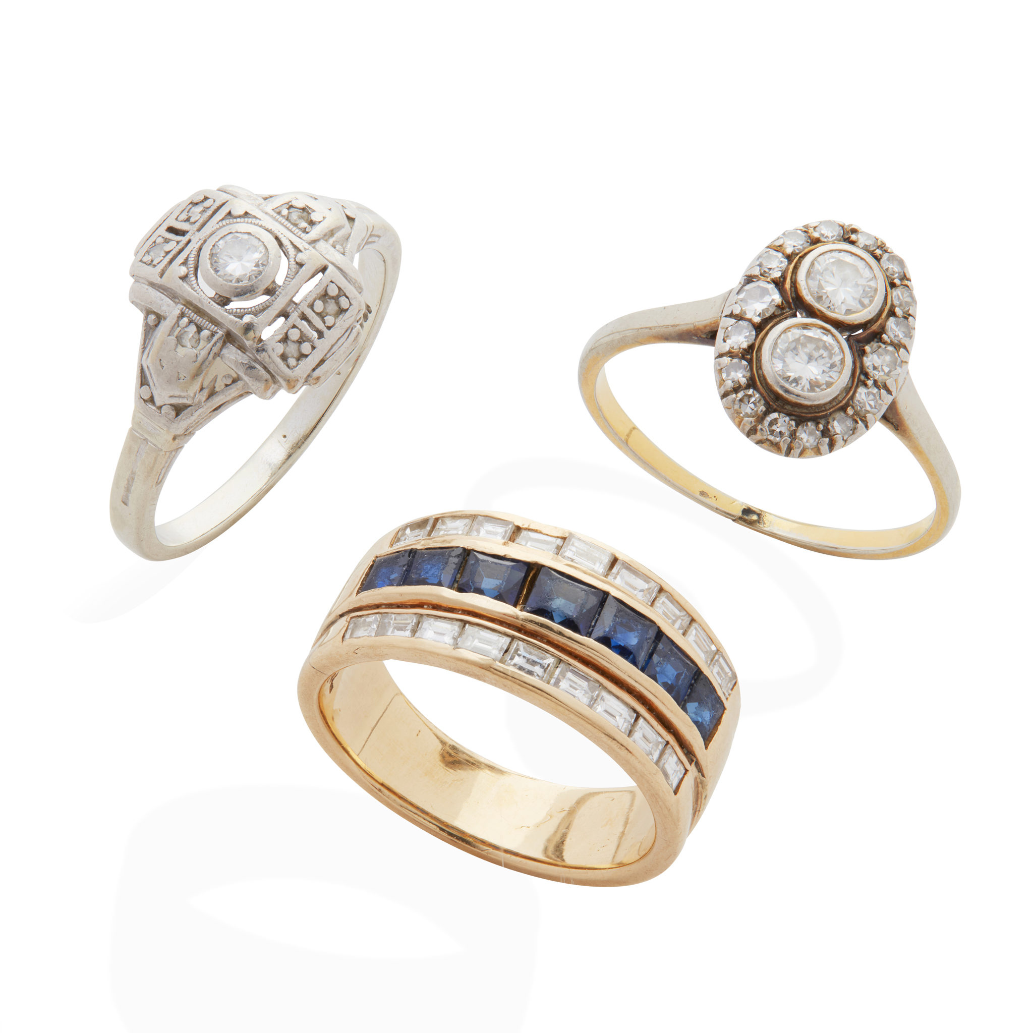 A collection of three gem-set rings