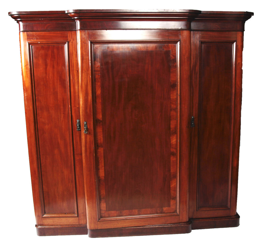 A Victorian mahogany three door breakfront wardrobe