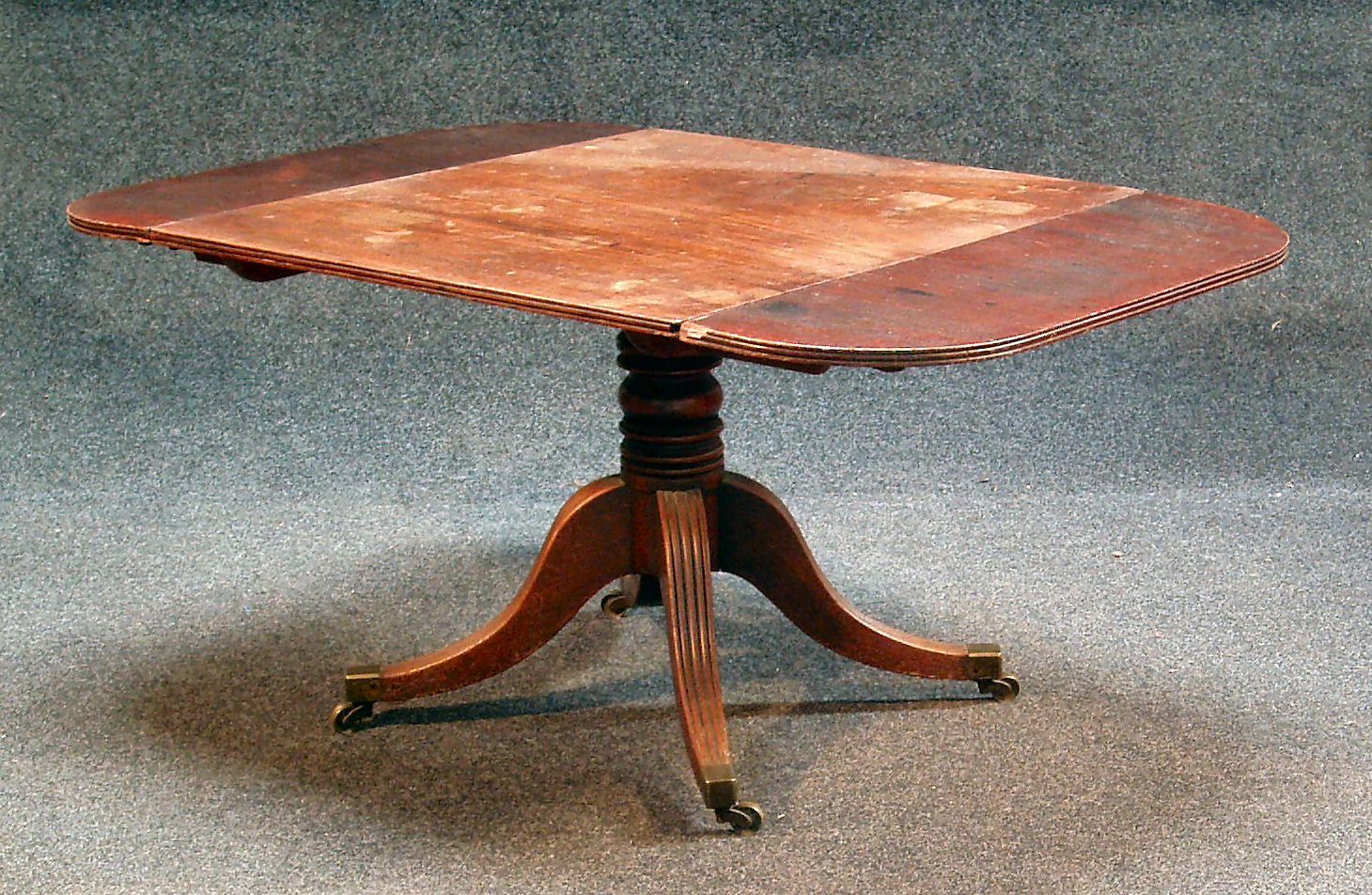 A Regency mahogany supper table,