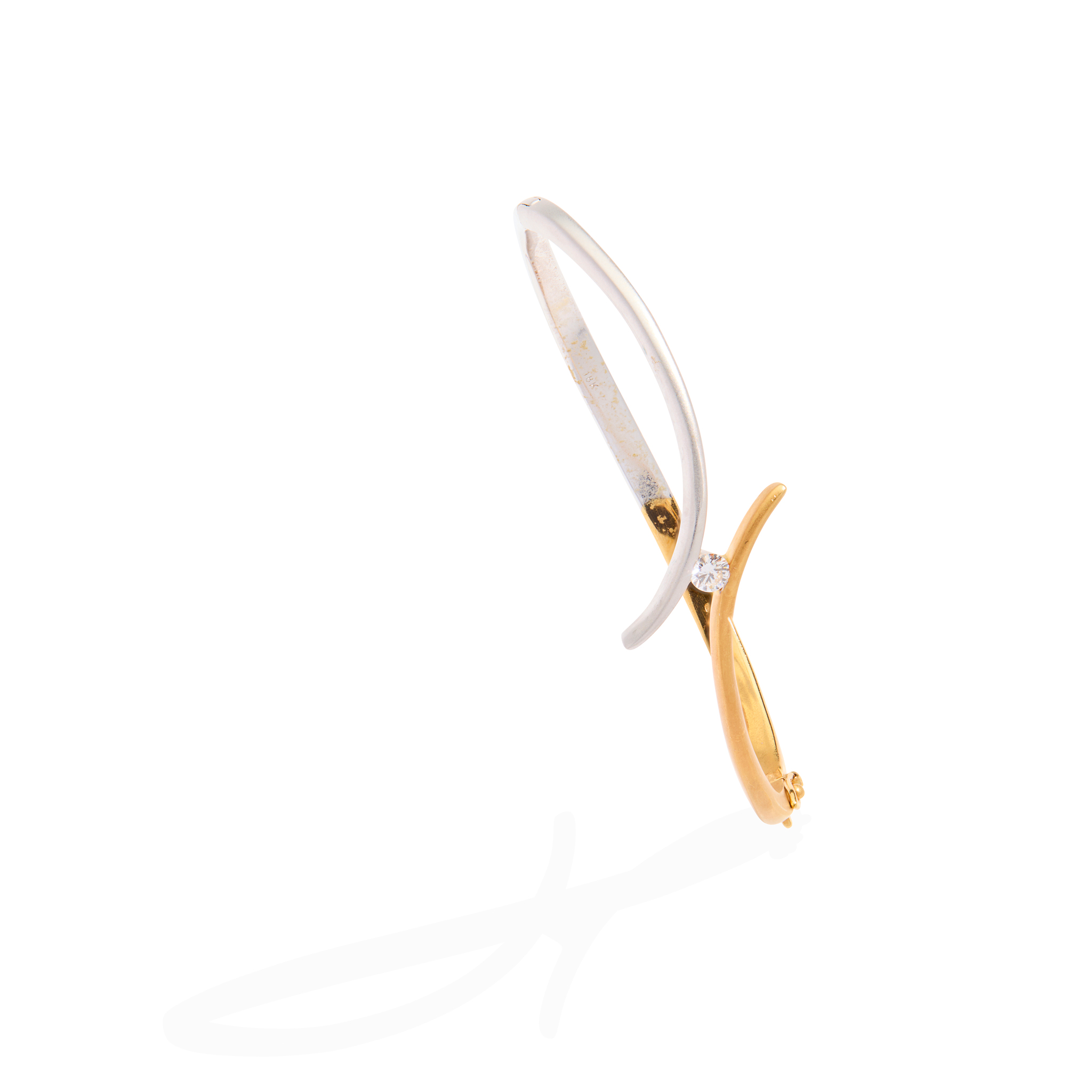 A bi-coloured diamond bangle