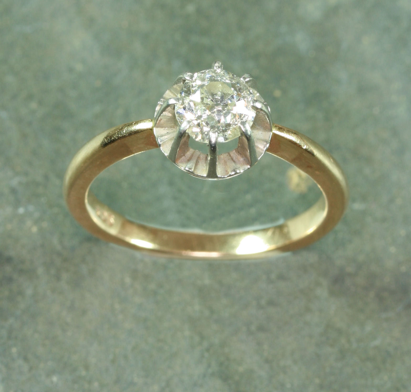 A 9ct gold mounted diamond single-stone ring,