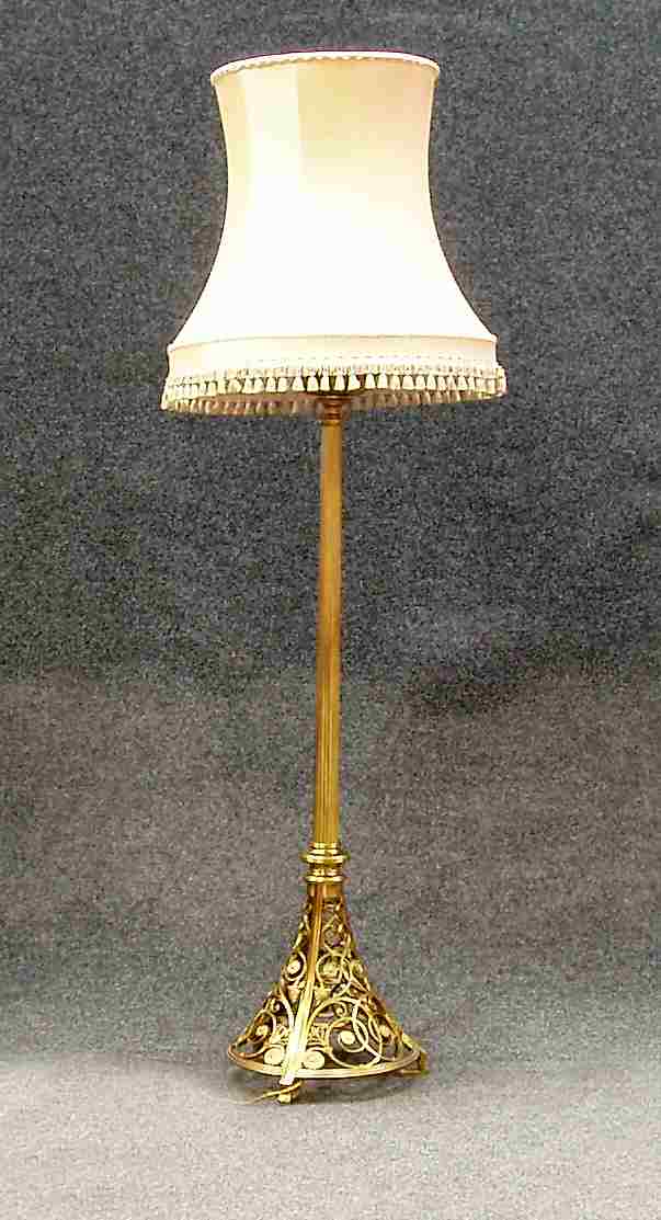 A brass standard lamp,