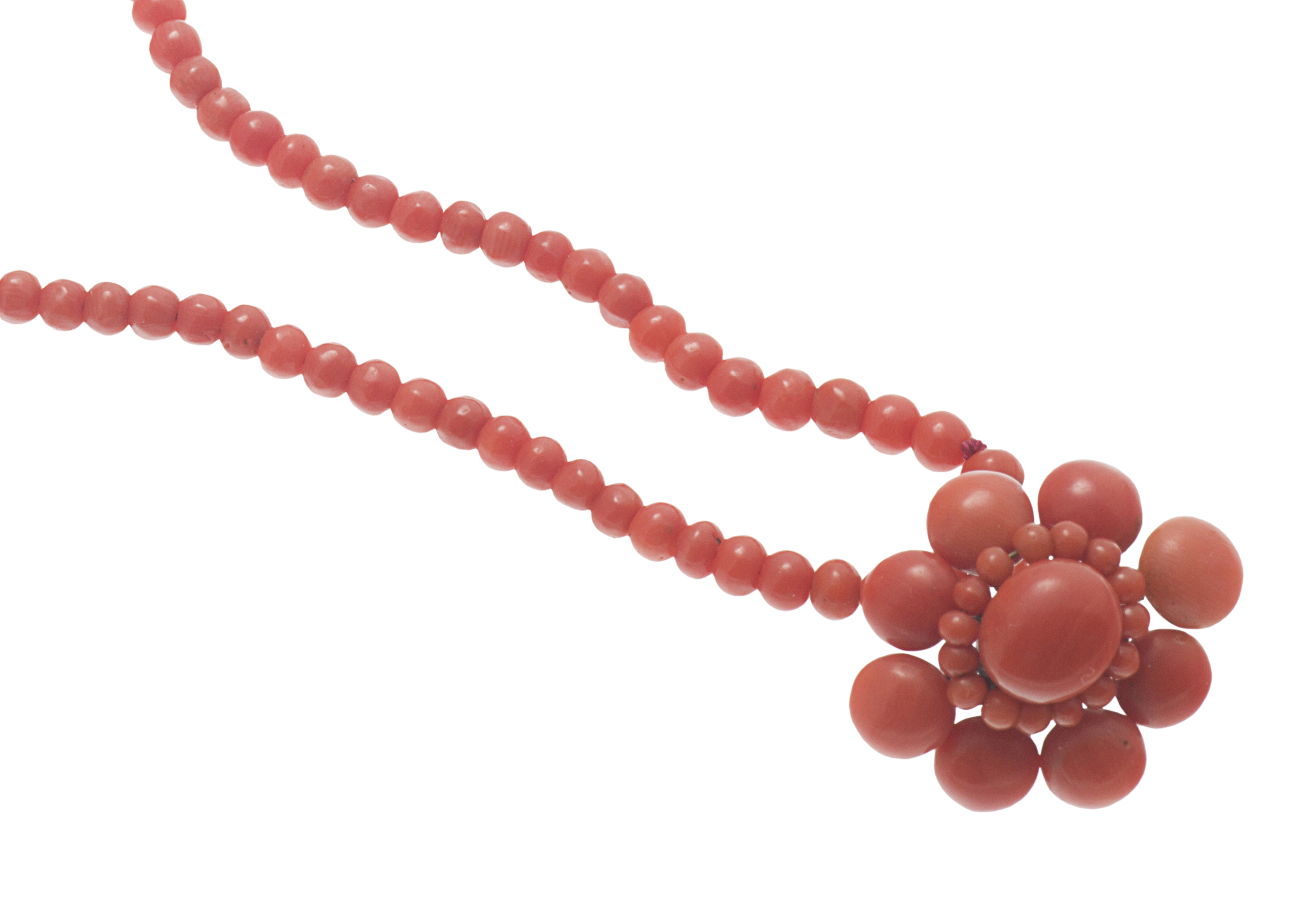 A coral necklace and pendant