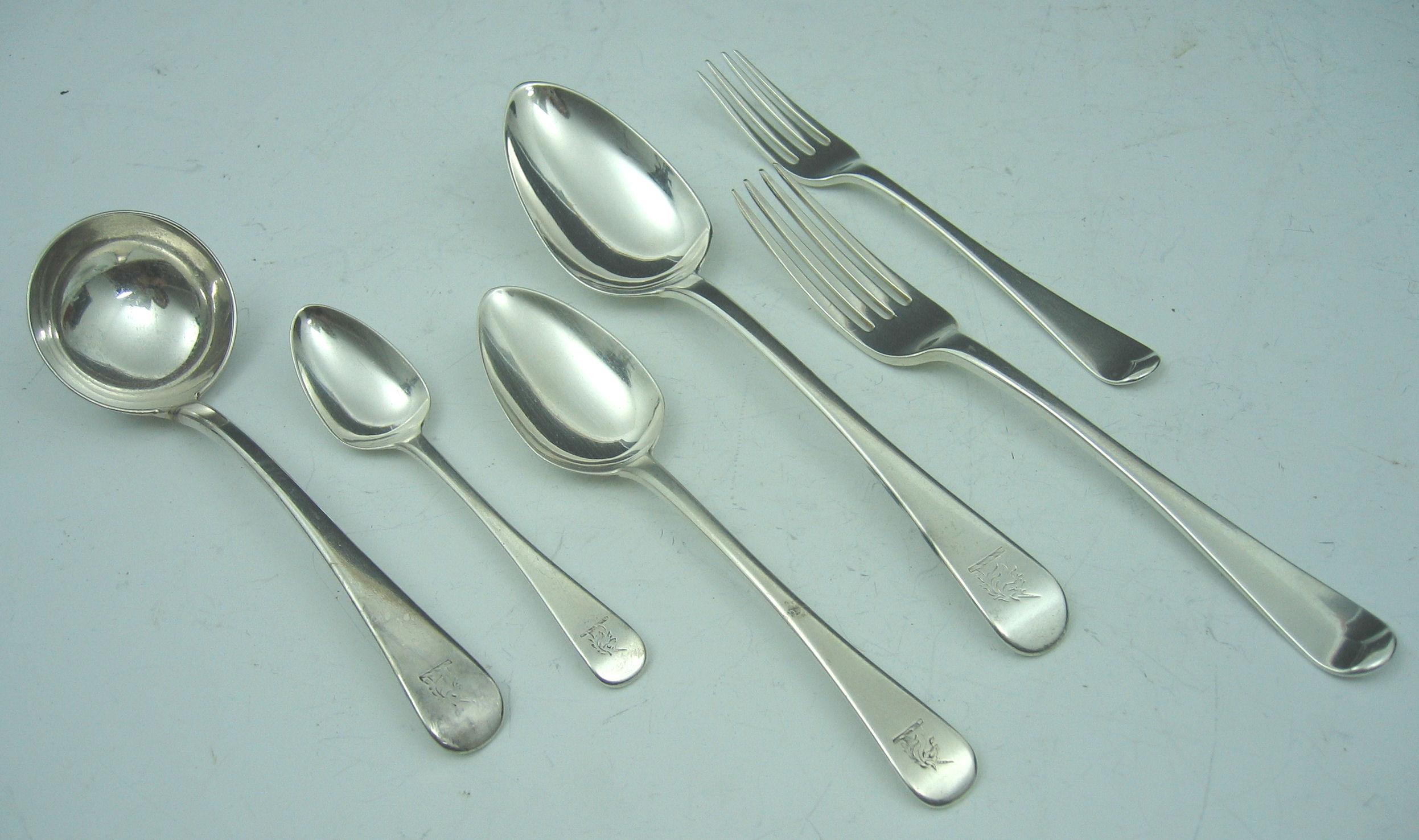 A collection of Old English pattern flatware,