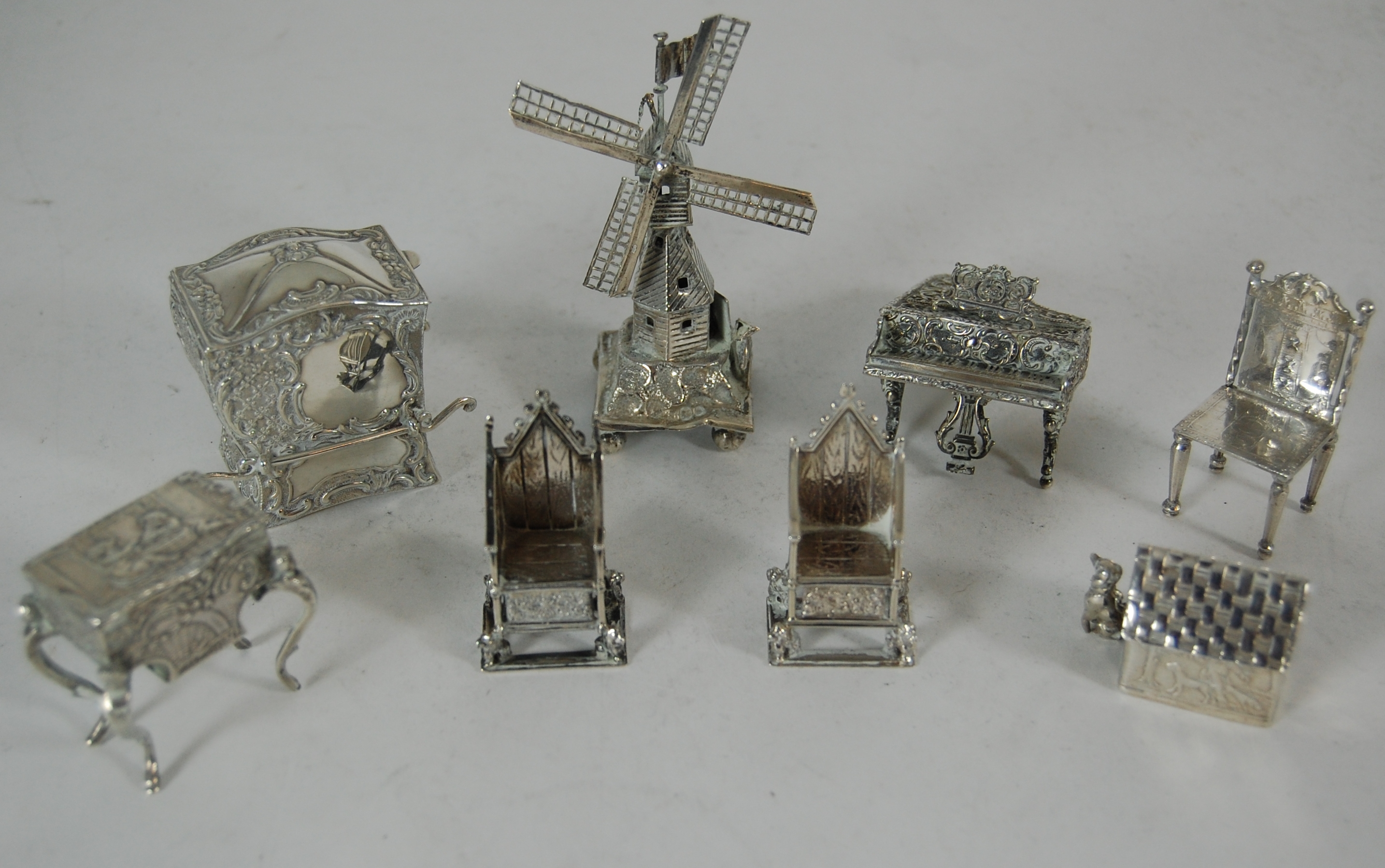 A collection of miniature silver