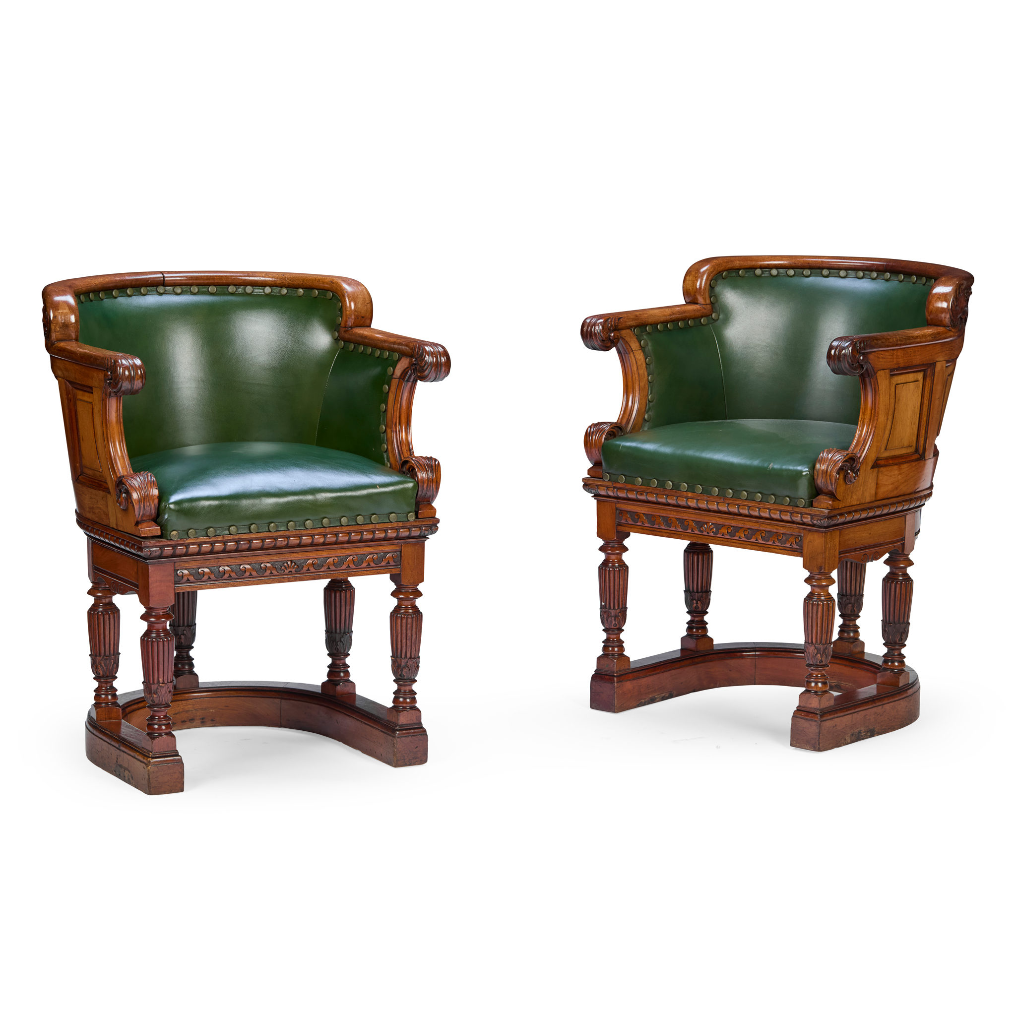 PAIR OF CARVED MAHOGANY LEATHER UPHOLSTERED SHIP'S TUB ARMCHAIRS