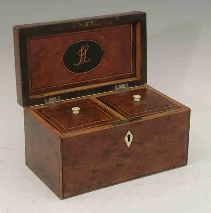 A George III yew wood tea caddy,