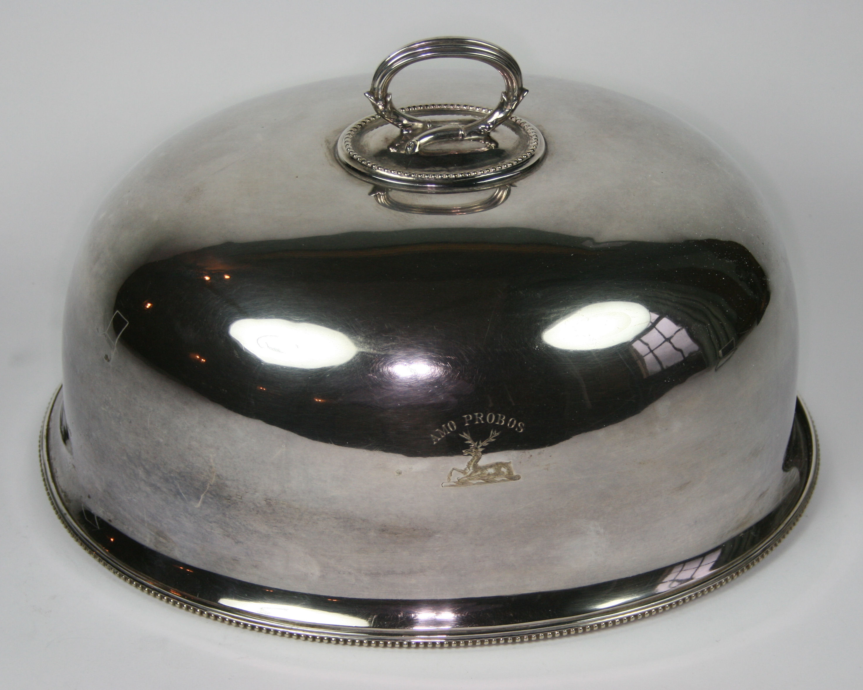 GRADUATED SUITE OF FOUR SILVER PLATED MEAT COVERS