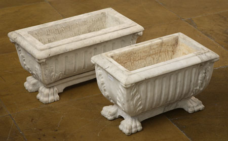 A pair of grey marble planters