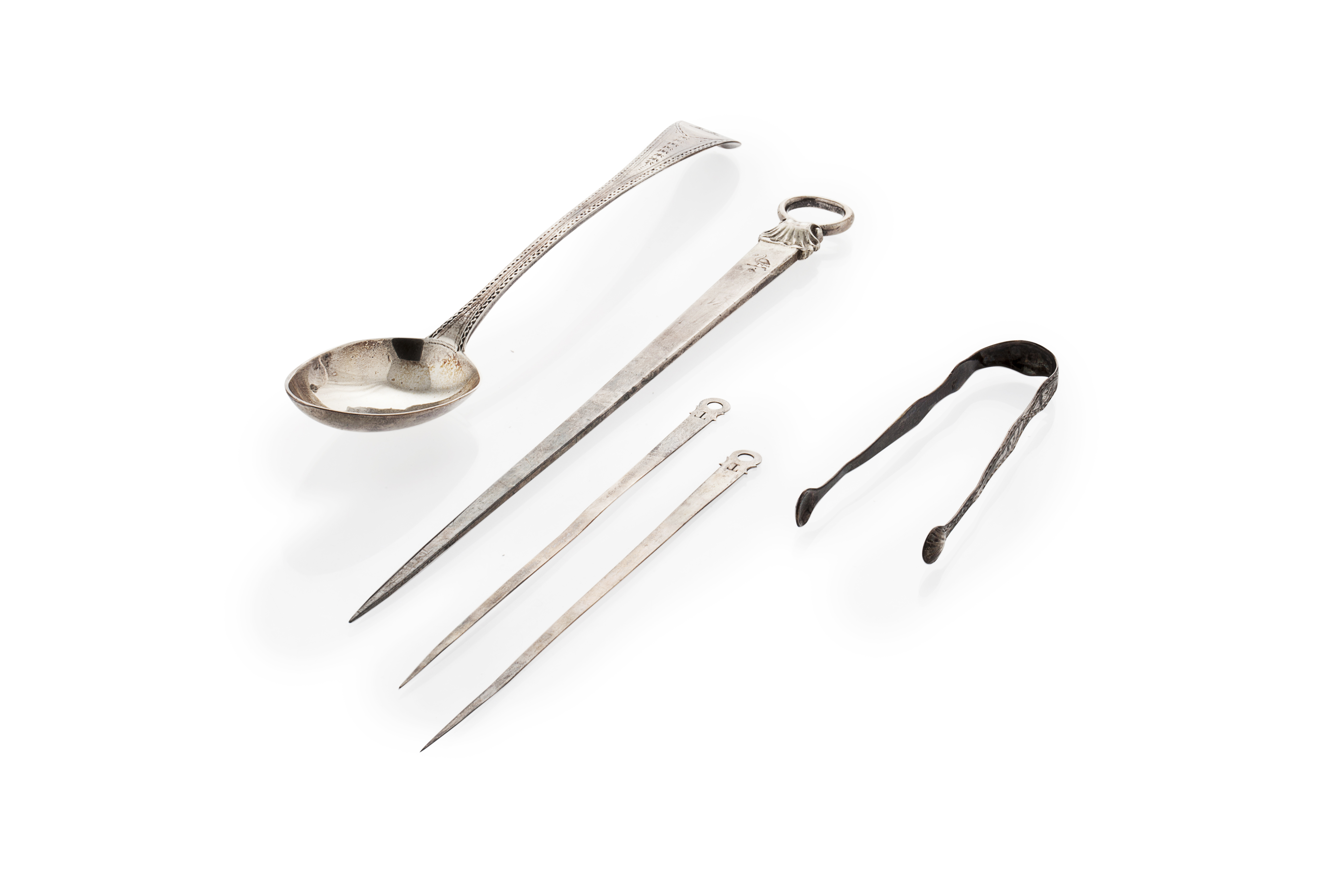 A George III basting spoon and meat skewers