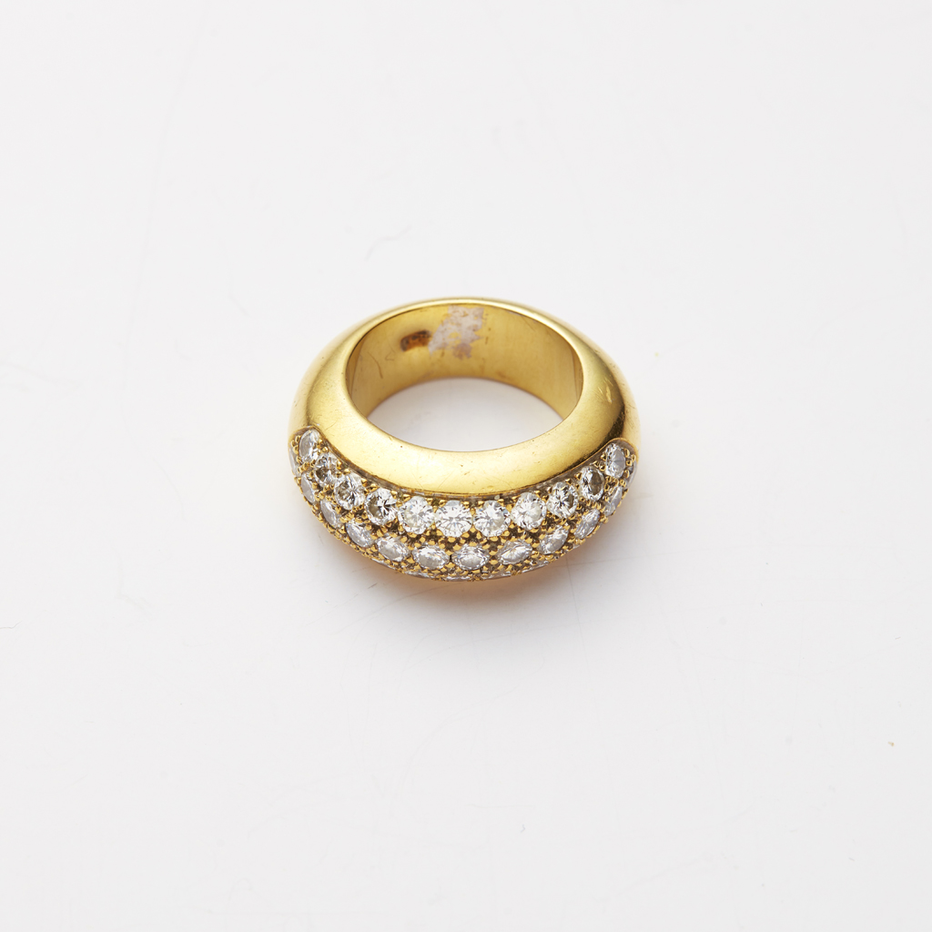 A diamond set bombe ring