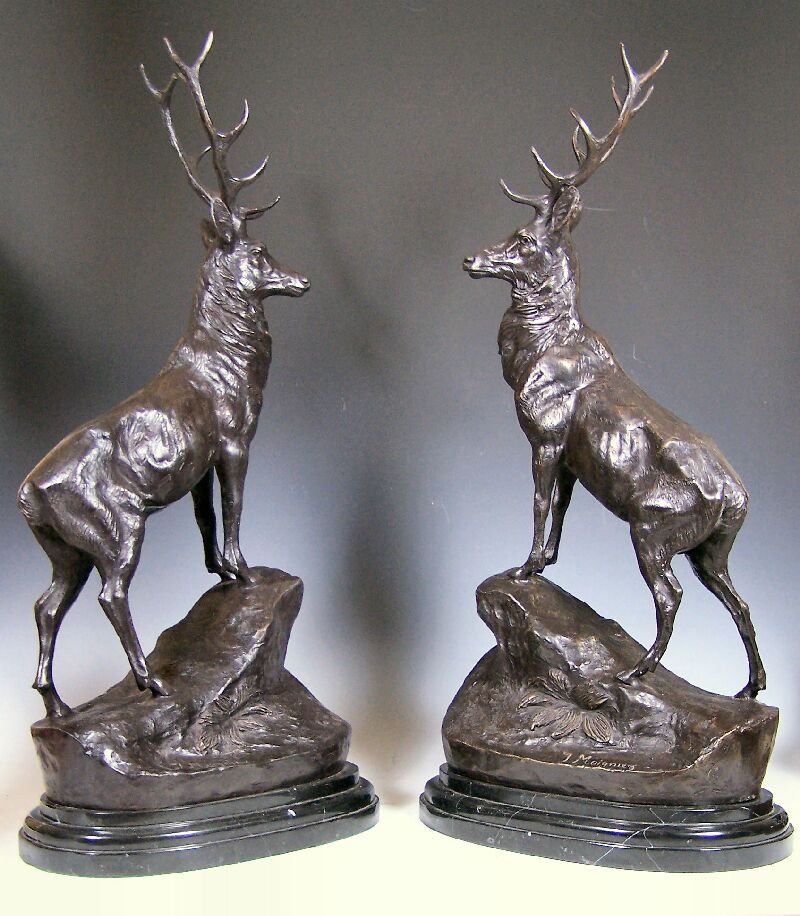 A pair of bronze stags after Jules Moigniez