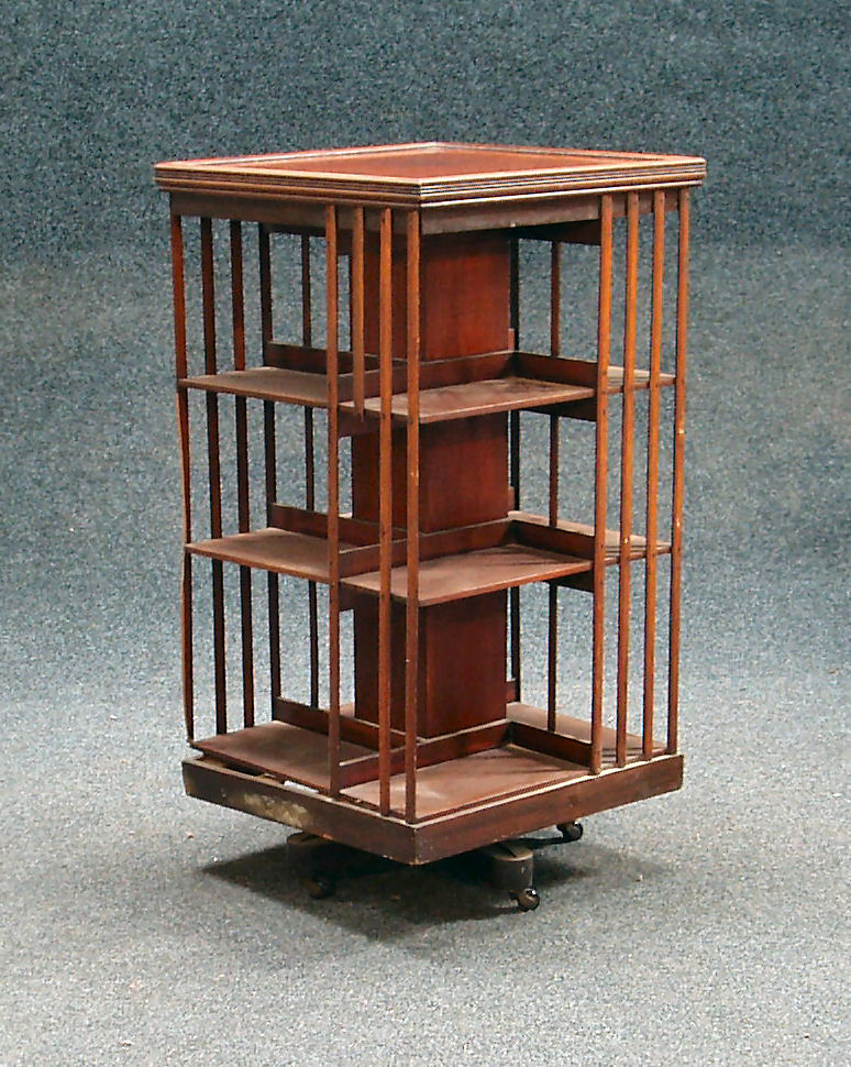 A Victorian oak revolving bookcase