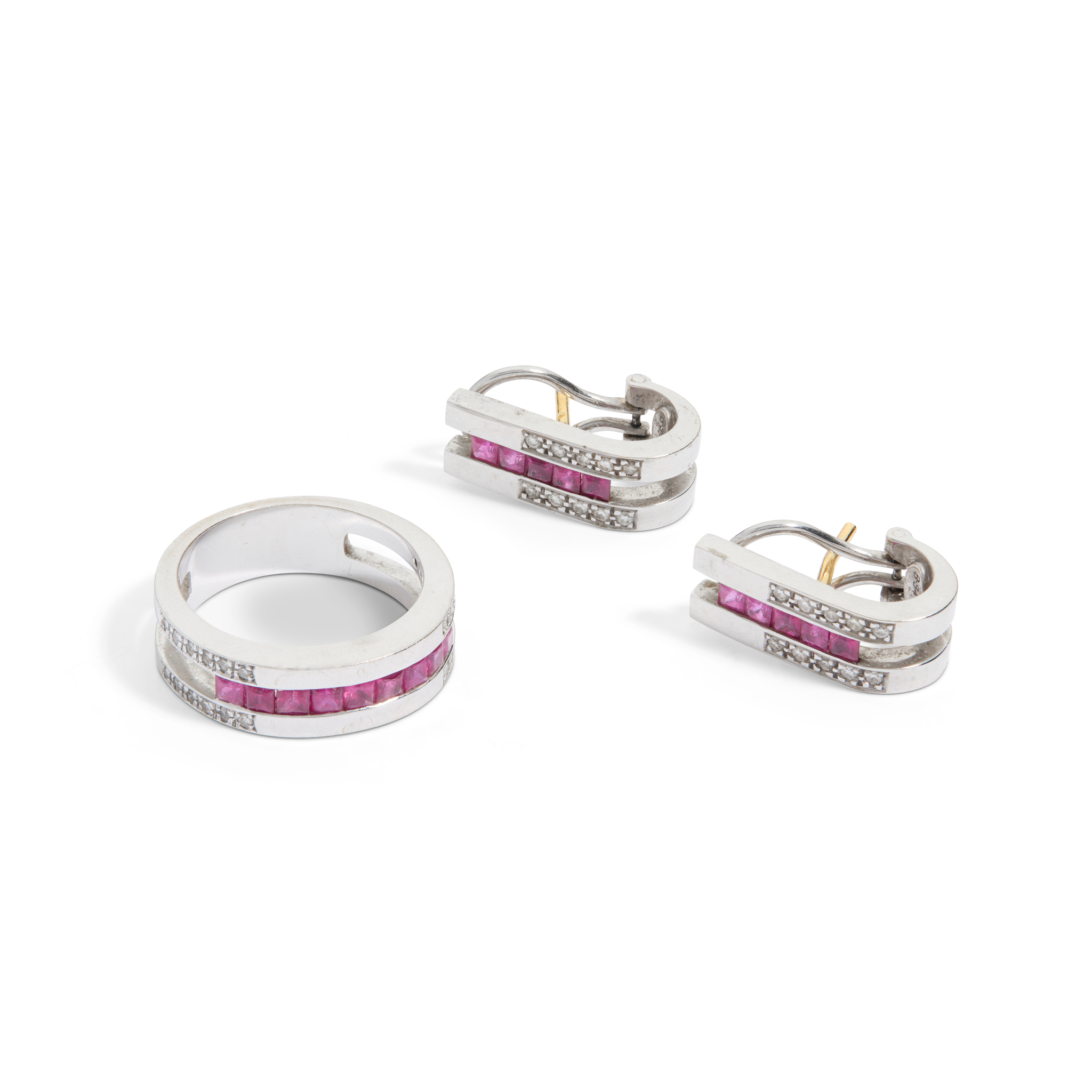 A ruby and diamond ring and matching earrings