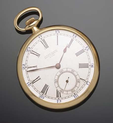 Ulysse Nardin - an 18k slimline open faced keyless wind pocket watch,