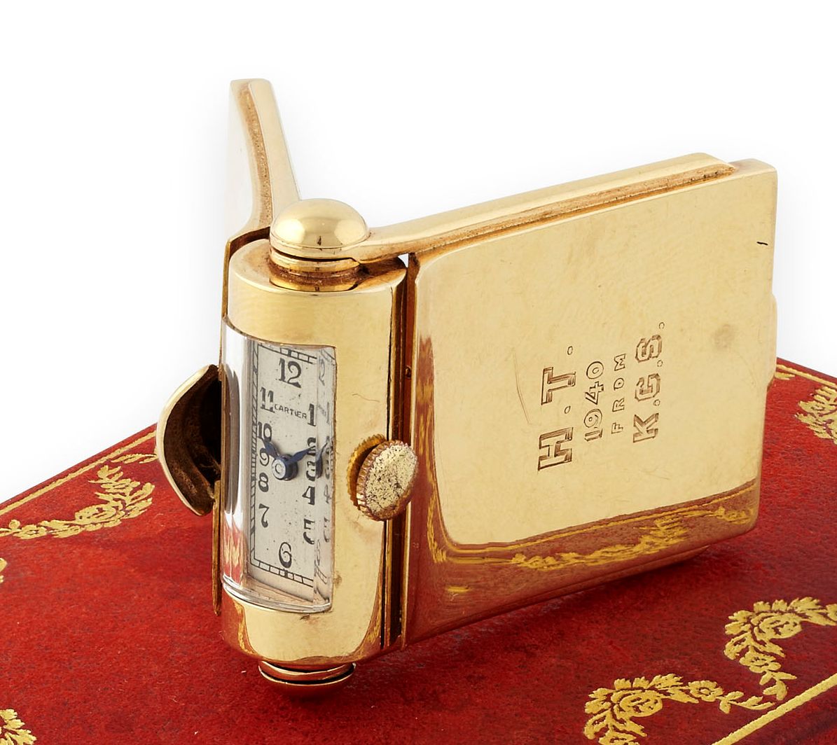CARTIER - a scarce early 20th century miniature travel clock/photograph frame