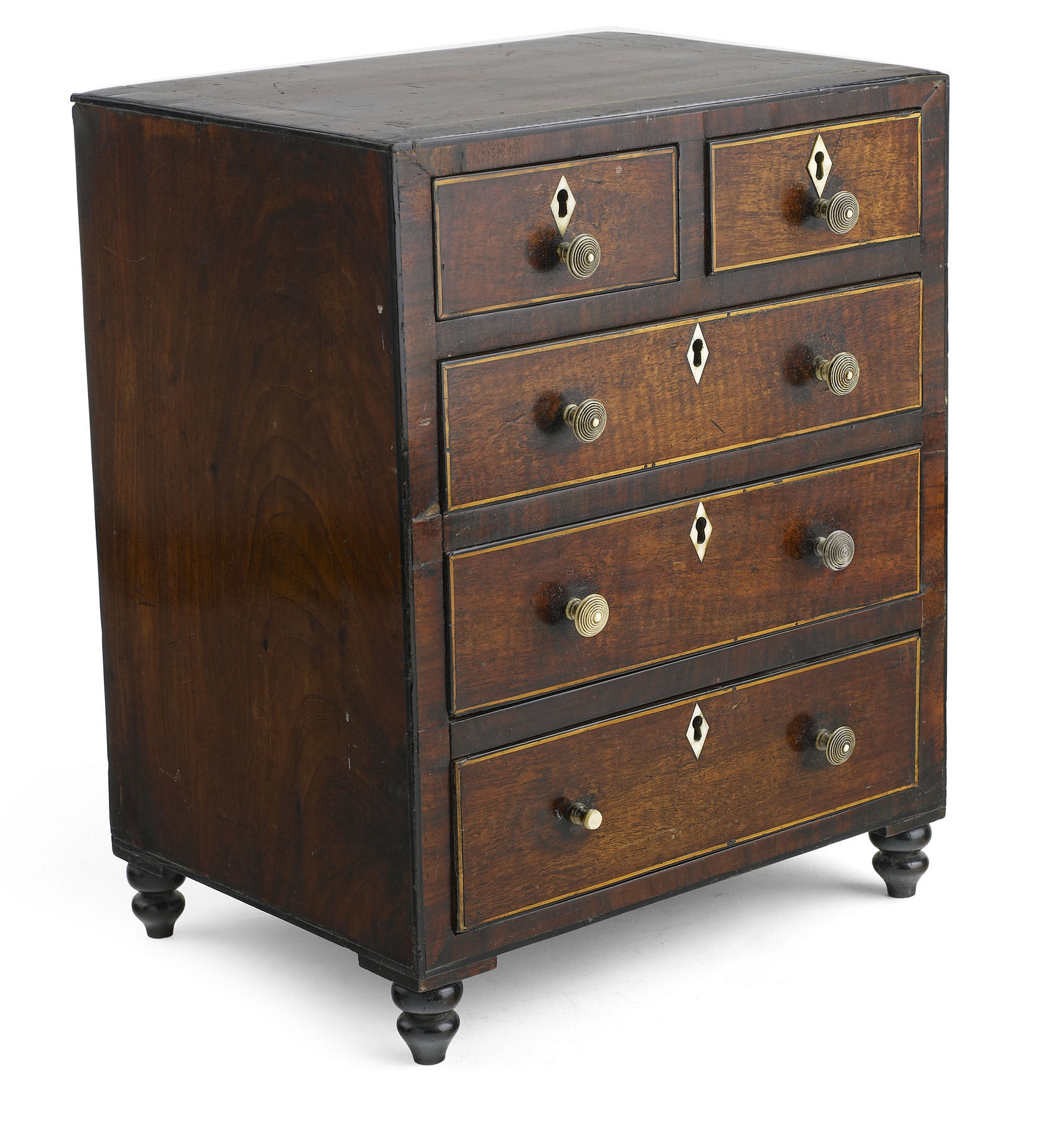 A George IV mahogany and crossbanded miniature chest of drawers, circa 1825