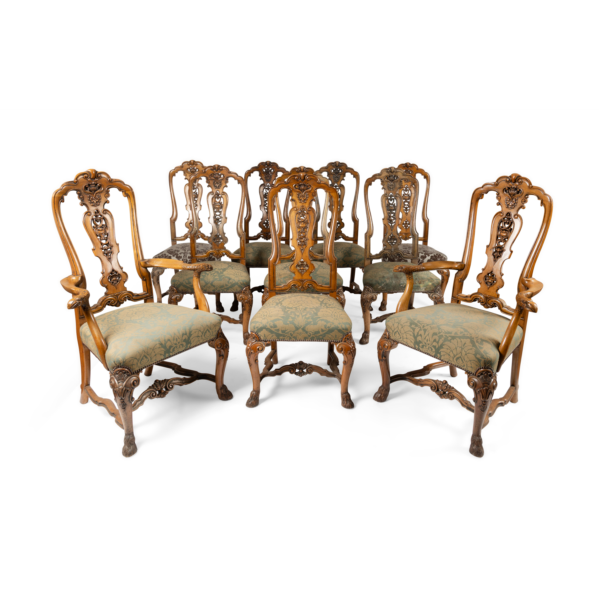 A SET OF TEN WALNUT DINING CHAIRS