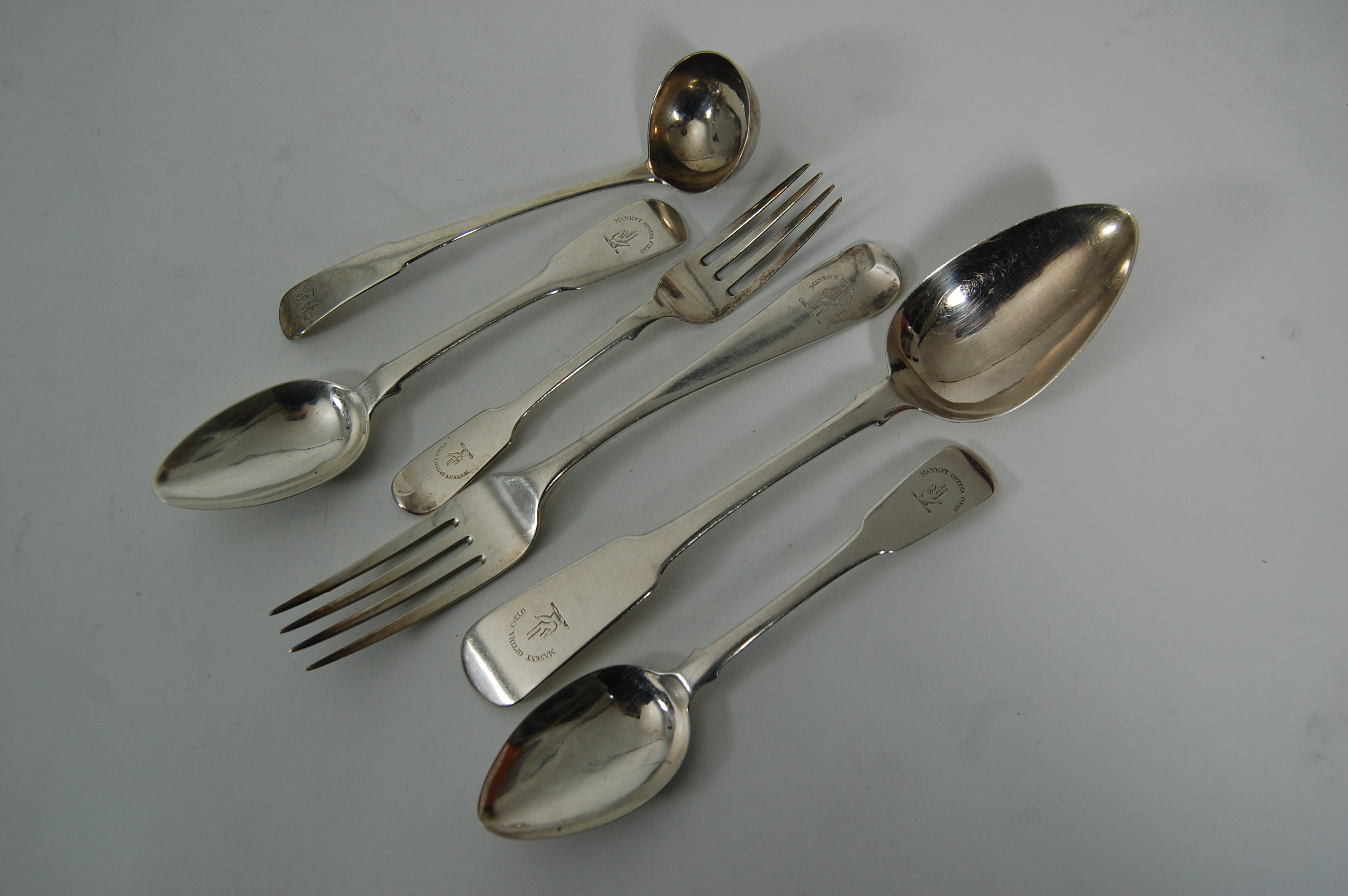 A group of cutlery and flatware
