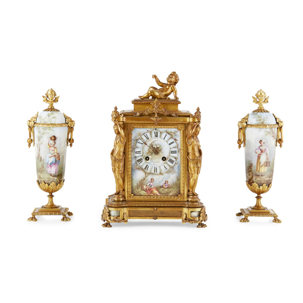 FRENCH PORCELAIN AND GILT BRASS THREE-PIECE CLOCK GARNITURE