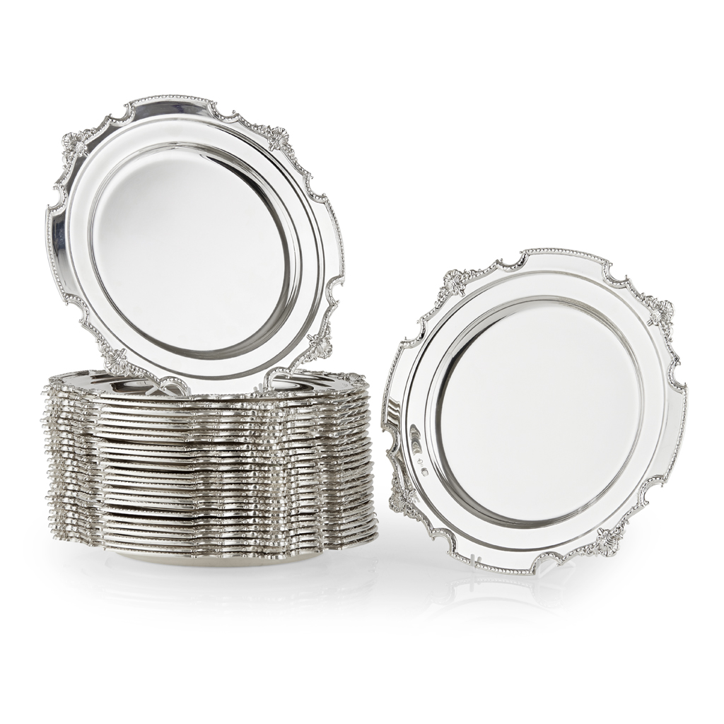 SET OF TWENTY-SIX PLATED UNDER PLATES