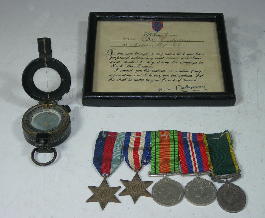 A collection World War II medals and ephemera