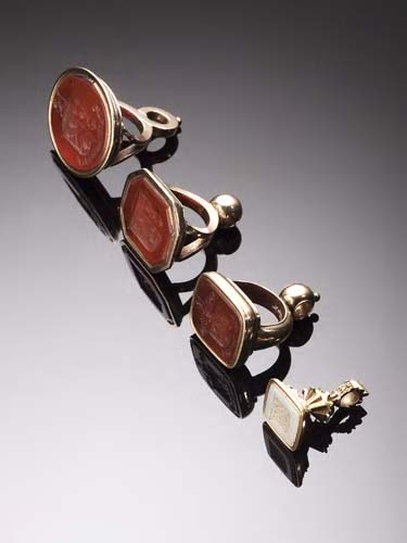 A collection of four gold mounted fob seals,