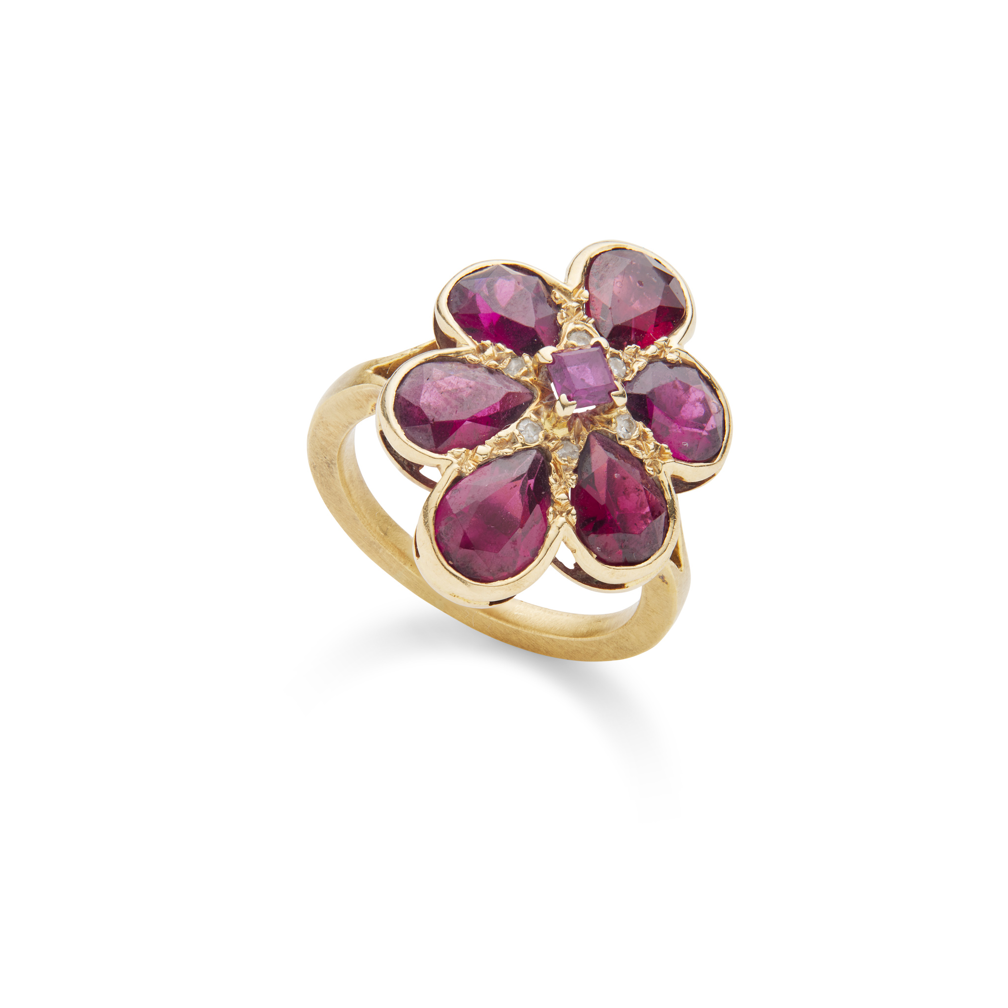 Polly Gasston (Attributed): A garnet and diamond flower ring